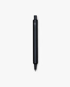 The HMM Ballpoint Pen (Black), featuring a hexagonal body, is centered on a plain white background. This refillable pen combines sleek design with everyday functionality.