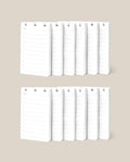 Two rows of white Discbound Analog Refill (12-pack) notepads with checklist designs and checkboxes are neatly arranged against a beige background—ideal for use with Analog Cards or as refills for your Discbound Analog system.