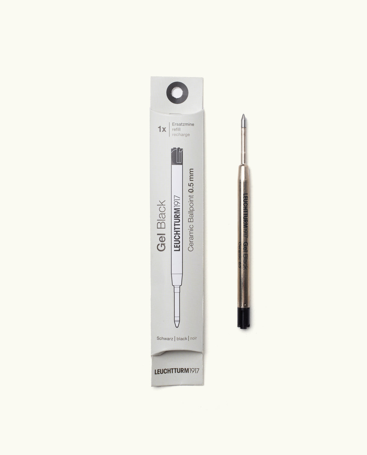 A Black Gel Pen Refill (The Ugmonk Pen) is shown beside its white rectangular box, which features black text and a line illustration of the black gel refill.