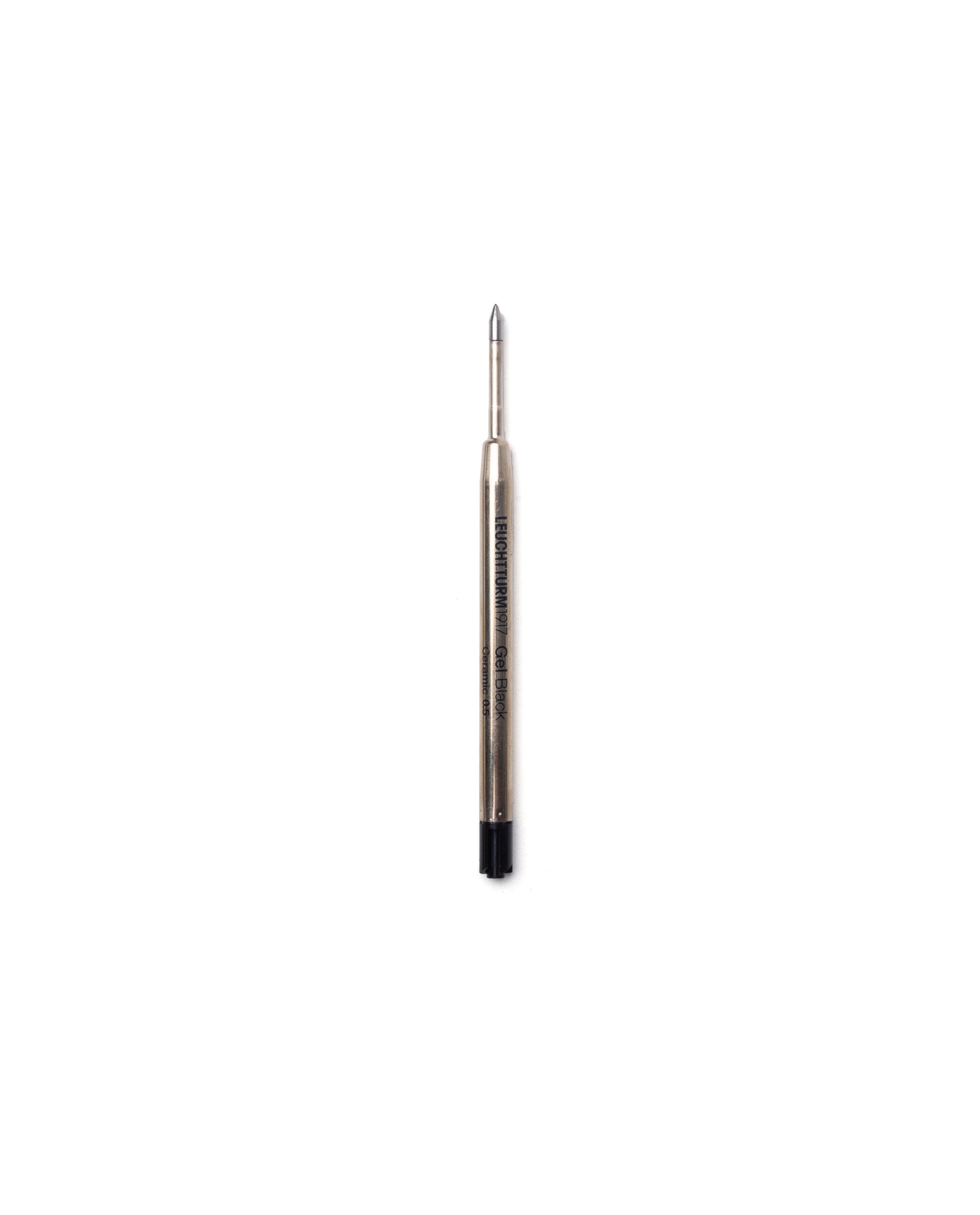 A Black Gel Pen Refill (The Ugmonk Pen) with a black tip is centered on a white background. Black text appears along the body of the refill.