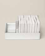 An Analog Archive (Silver Aluminum) desk organizer holding a stack of index cards separated by metal dividers.