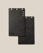 *Covers Only* – Leather Discbound Analog (Black): This set includes two rectangular, black full-grain leather covers with rounded corners and three top-edge holes for your Discbound Analog system. One features the Analog logo; the other has a small square logo at the bottom.