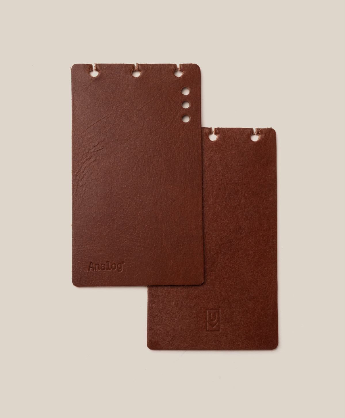 The *Covers Only* – Leather Discbound Analog (Brown) set includes two brown full-grain leather covers, made in the USA, with rounded corners and three top holes—one embossed with "Discbound Analog," one with a small logo—against a beige background.