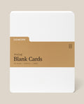 Analog Blank Cards - Large: 50 white, 5x8.5 inch cards made from premium uncoated cardstock, wrapped with a brown paper band featuring branding and product details.