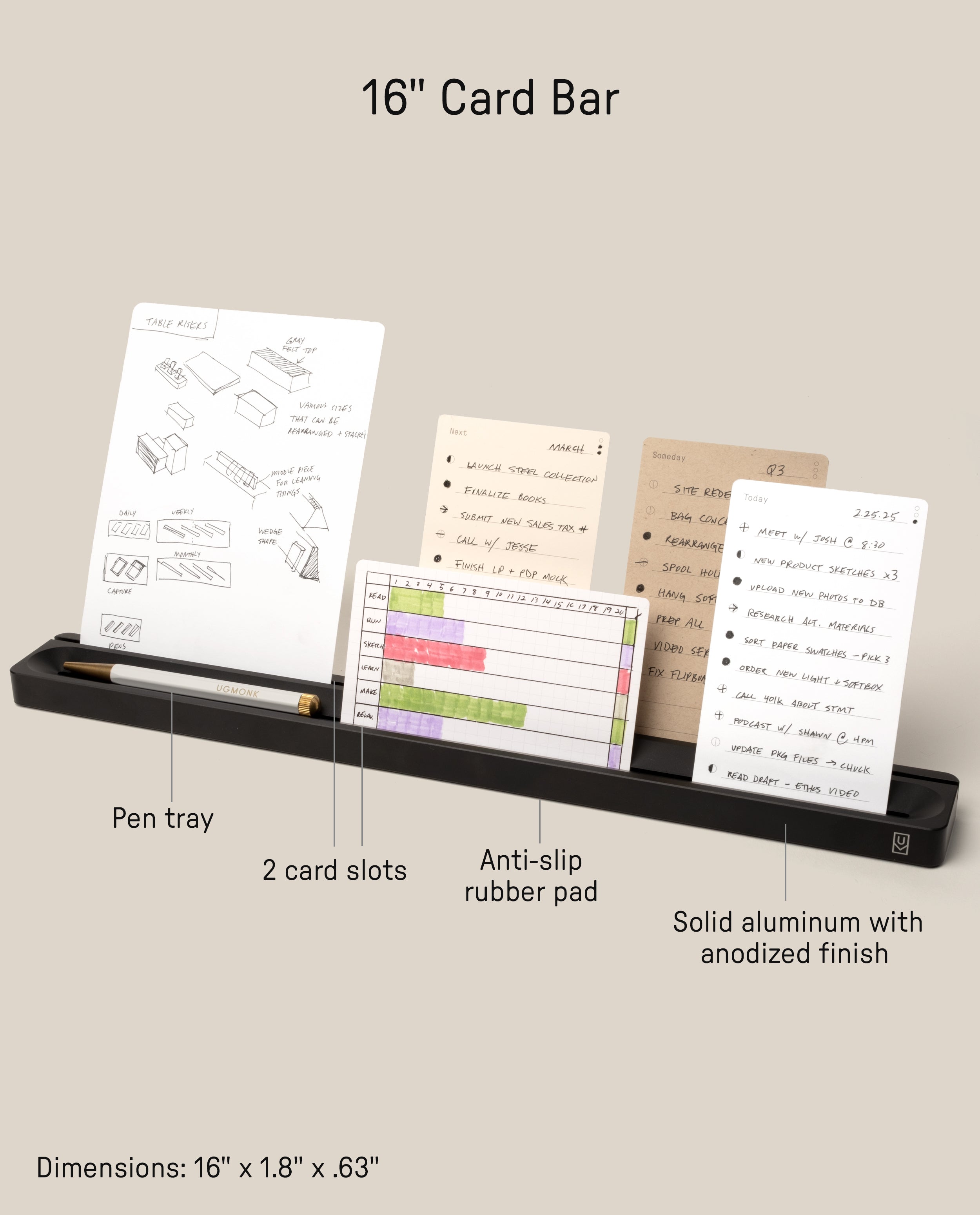 The Analog Card Bar (Large 16" – Black) is a sturdy aluminum card holder designed to keep up to four notecards upright next to your pen. Key features include a dedicated desktop pen tray, two convenient card slots, an anti-slip rubber pad for stability, and durable anodized construction. Dimensions: 16 x 1.8 x .63 inches.