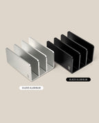 Two Analog Card Organizer trays—one silver, one black aluminum—each with three slots, are displayed side by side on a beige background. Labels indicate SILVER ALUMINUM and BLACK ALUMINUM card trays.