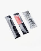 Three Pen Refills (Craft Design Technology Multifunctional Pen) for 0.5mm pens are displayed on a white surface. The packages feature black, red, and white designs, each clearly labeled with the color and size in both Japanese and English. These multifunction pen refills offer precise writing with 0.5mm lead and are compatible with Craft Design Technology pens.