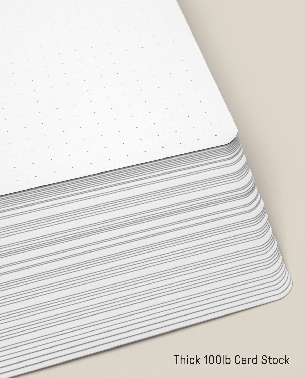 A 12-pack of Analog Dot Grid Cards - Large, featuring thick white cards with a dot grid and rounded corners, made from 100lb card stock.