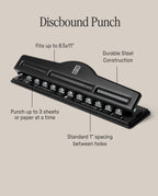 A black Discbound Punch on a beige background with labeled features: fits up to 8.5x11" paper, durable steel, punches 3 sheets at once, and standard 1" spacing—perfect for any discbound system or Ugmonk Discbound Journal.