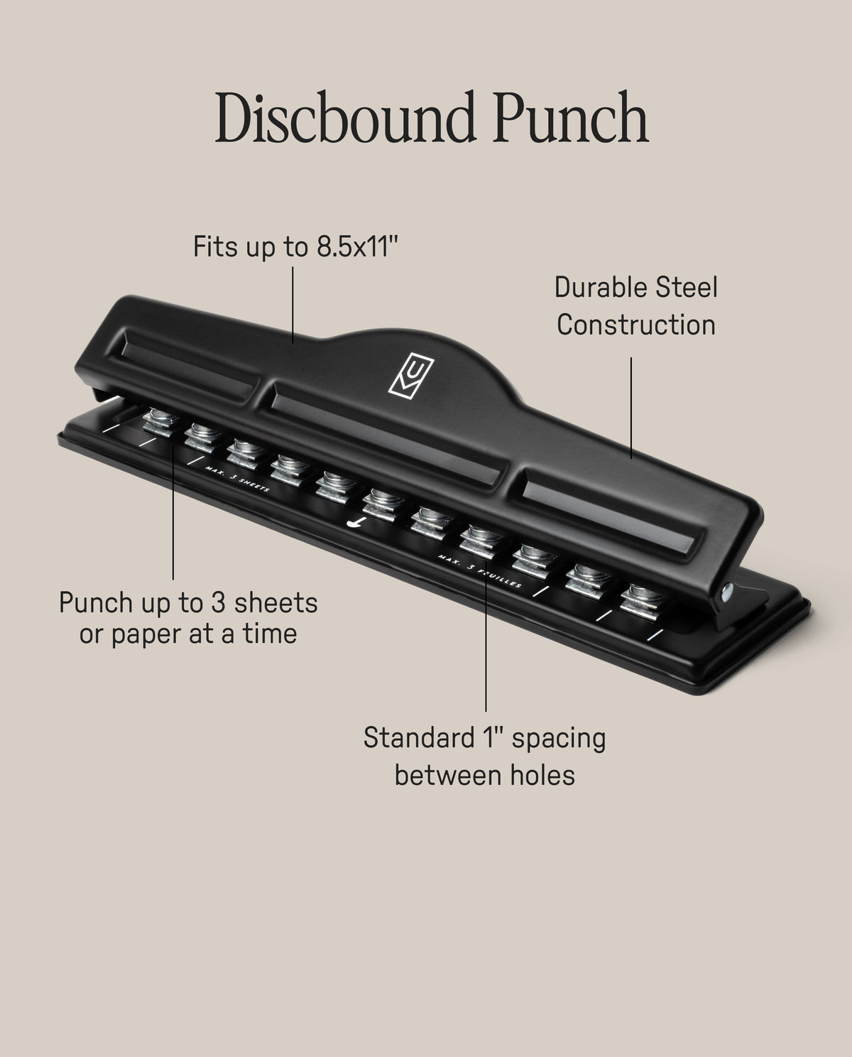 A black Discbound Punch on a beige background with labeled features: fits up to 8.5x11" paper, durable steel, punches 3 sheets at once, and standard 1" spacing—perfect for any discbound system or Ugmonk Discbound Journal.