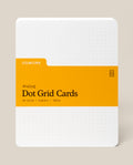 A pack of Analog Dot Grid Cards - Large with a yellow label, featuring 50 white uncoated 5x6.5" cardstock cards with a faint dot grid and rounded corners—ideal for sketching—shown on a neutral background.
