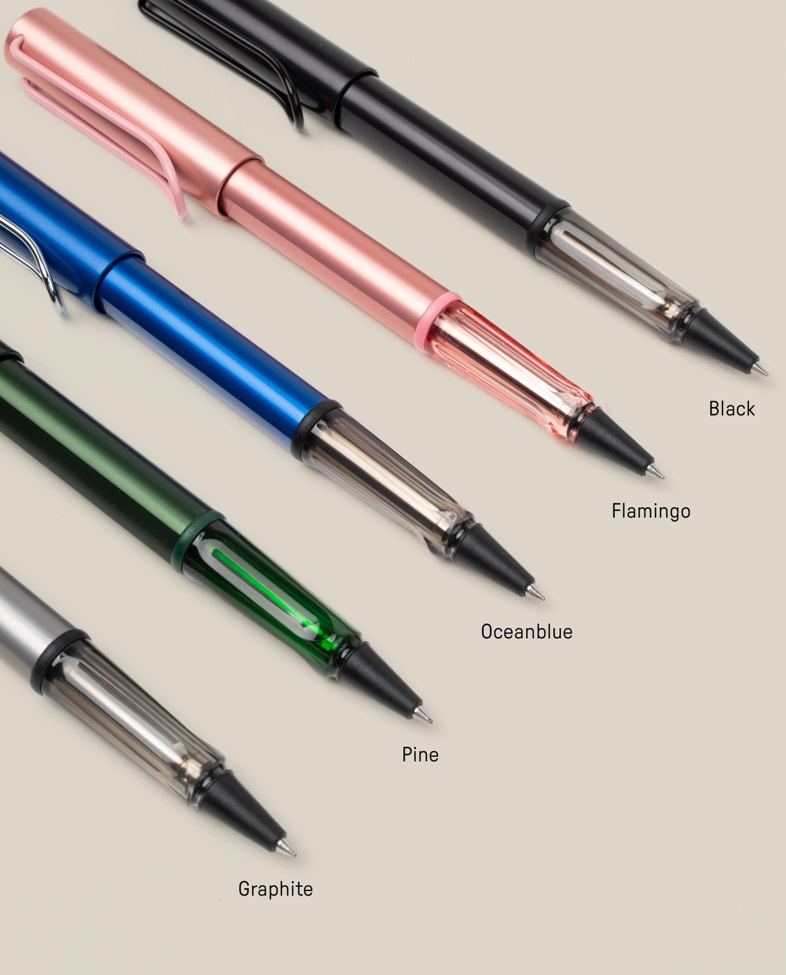 The LAMY AL-star Rollerball (Graphite) is showcased diagonally on a light background, highlighting its sleek design, refillable rollerball feature, and smooth writing performance.