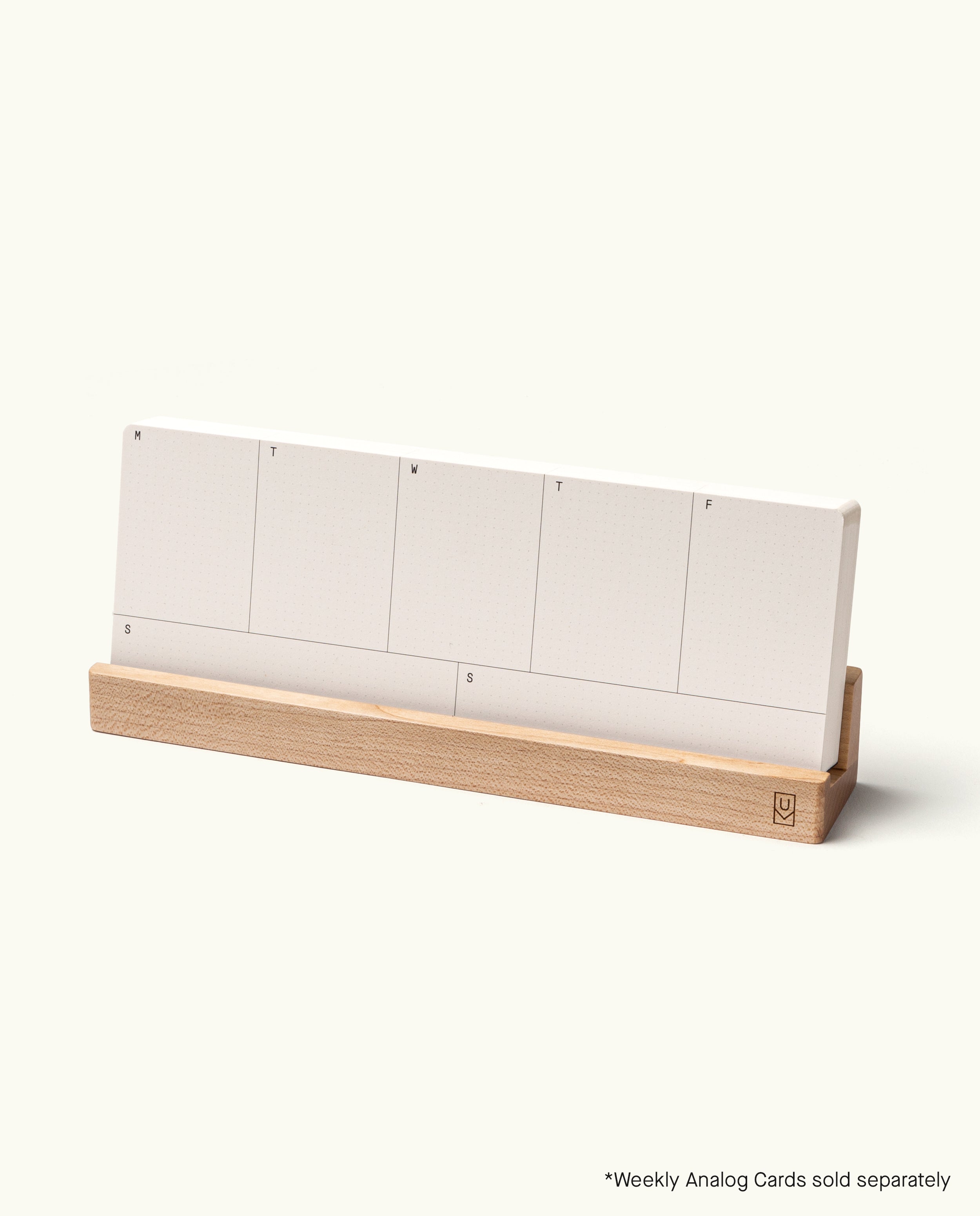 Analog Weekly Card Holder (Maple), handcrafted in Pennsylvania, holds a set of blank Analog Weekly Cards—each labeled with an initial for the day of the week. Text in the corner states: *Weekly Analog Cards sold separately.