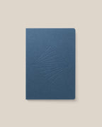 A Layflat Notebook (Navy) with a geometric embossed diamond pattern on the cover, displayed against a plain light beige background.