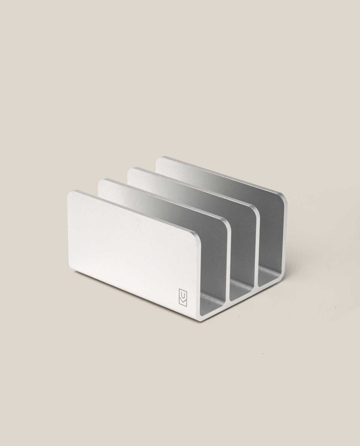 The Analog Card Organizer (Silver Aluminum) is a minimalist card holder with three slots, shown on a light beige background.
