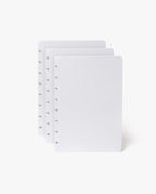 The Discbound Heirloom Journal Bundle includes a black leather 6"x8.5" journal and three white, dotted refill sheets with disc-binding holes—ideal for your refillable notebook or discbound journal.