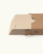 A pack of Analog - Someday Cards (3-Pack), featuring brown, lined cards partially slid out of a matching cardboard sleeve, displayed on a white background.