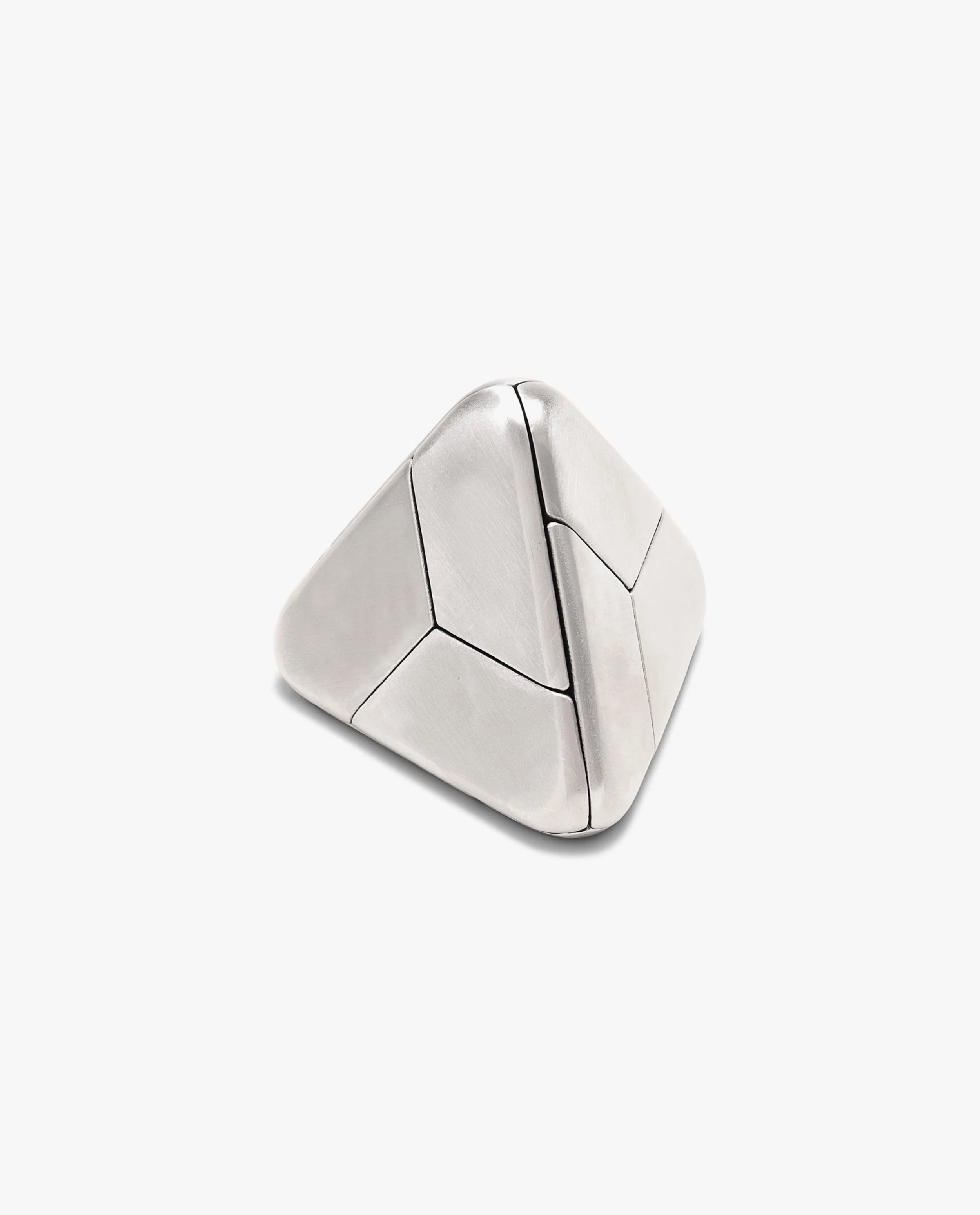 A stainless steel Craighill Tetra Puzzle, featuring a silver, pyramid-shaped form with smooth surfaces and segmented triangular panels reminiscent of a geometric puzzle, is set against a plain white background.