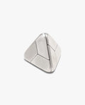 A stainless steel Craighill Tetra Puzzle, featuring a silver, pyramid-shaped form with smooth surfaces and segmented triangular panels reminiscent of a geometric puzzle, is set against a plain white background.