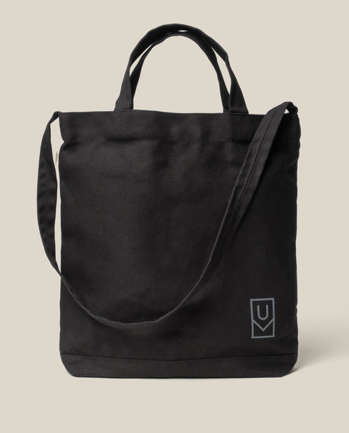 Utility Tote Bundle - Set of 3 black heavyweight cotton tote bag with two handles, a shoulder strap, and a small logo on the front lower right corner.