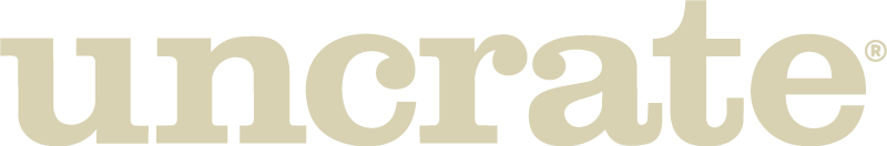 The word uncrate is written in bold, light beige lowercase letters on a light background.