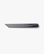 The Craighill Desk Knife (Vapor Black), shown on a white background, features a sleek stainless steel blade held in a black holder and offers precise cutting reminiscent of a Japanese kiridashi knife.