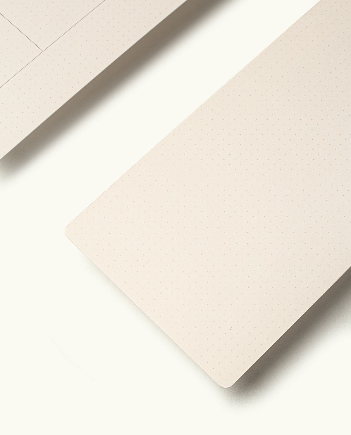 A close-up of a keyboard next to Analog Weekly Cards, ideal for enhancing your analog weekly kit.