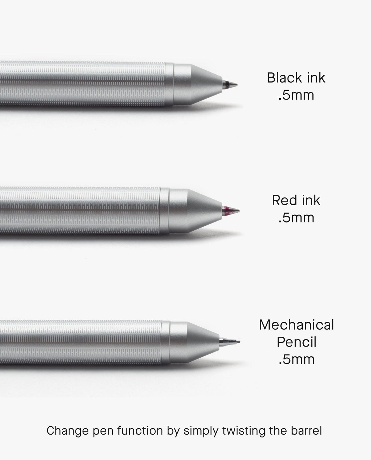 Three metallic Craft Design Technology Multifunctional Pens display black ink 0.5mm, red ink 0.5mm, and a 0.5mm mechanical pencil. Caption: Switch functions easily by twisting the barrel of this multifunctional pen.