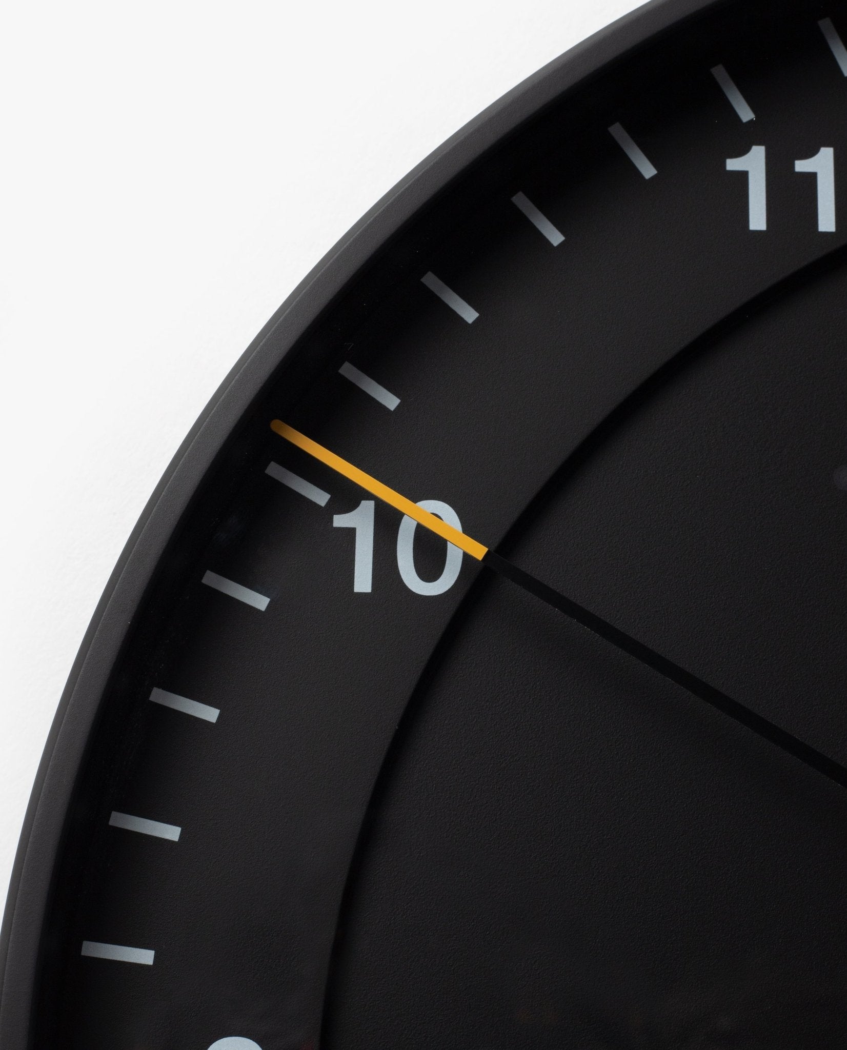 A close-up of the Braun Wall Clock (Black), celebrated for its minimalist design and easy-to-read clock face.