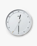 The Braun Wall Clock (White) is a round analog wall clock displaying the time as 12:30:35. The word "Braun" appears below the 12. It features an easy-to-read dial with black hour and minute hands, as well as a thin white silent sweeping second hand tipped in yellow.