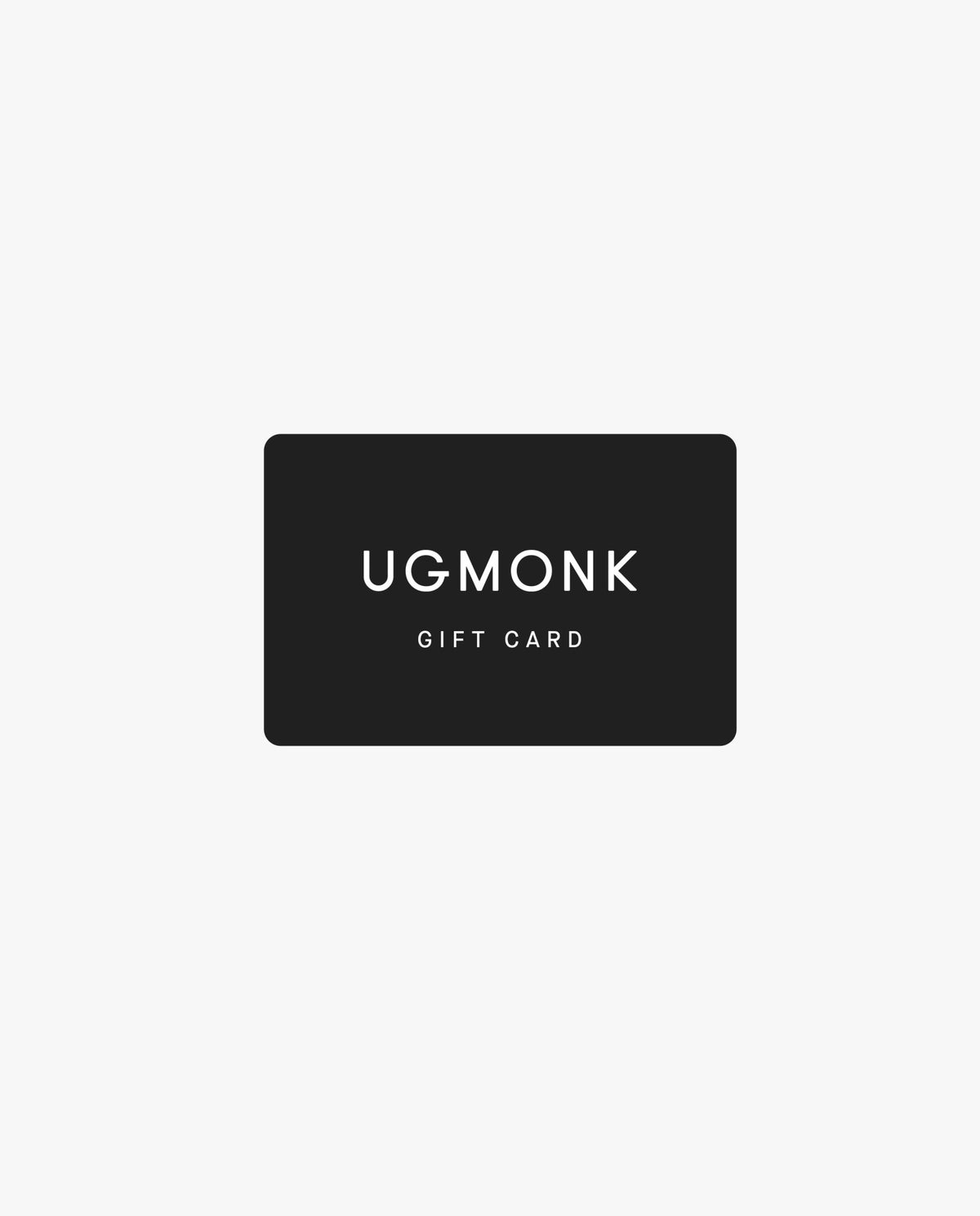 A black rectangular Ugmonk Gift Card is centered on a light gray background, with the name in white minimalist text—ideal for gifting and delivered conveniently via email.