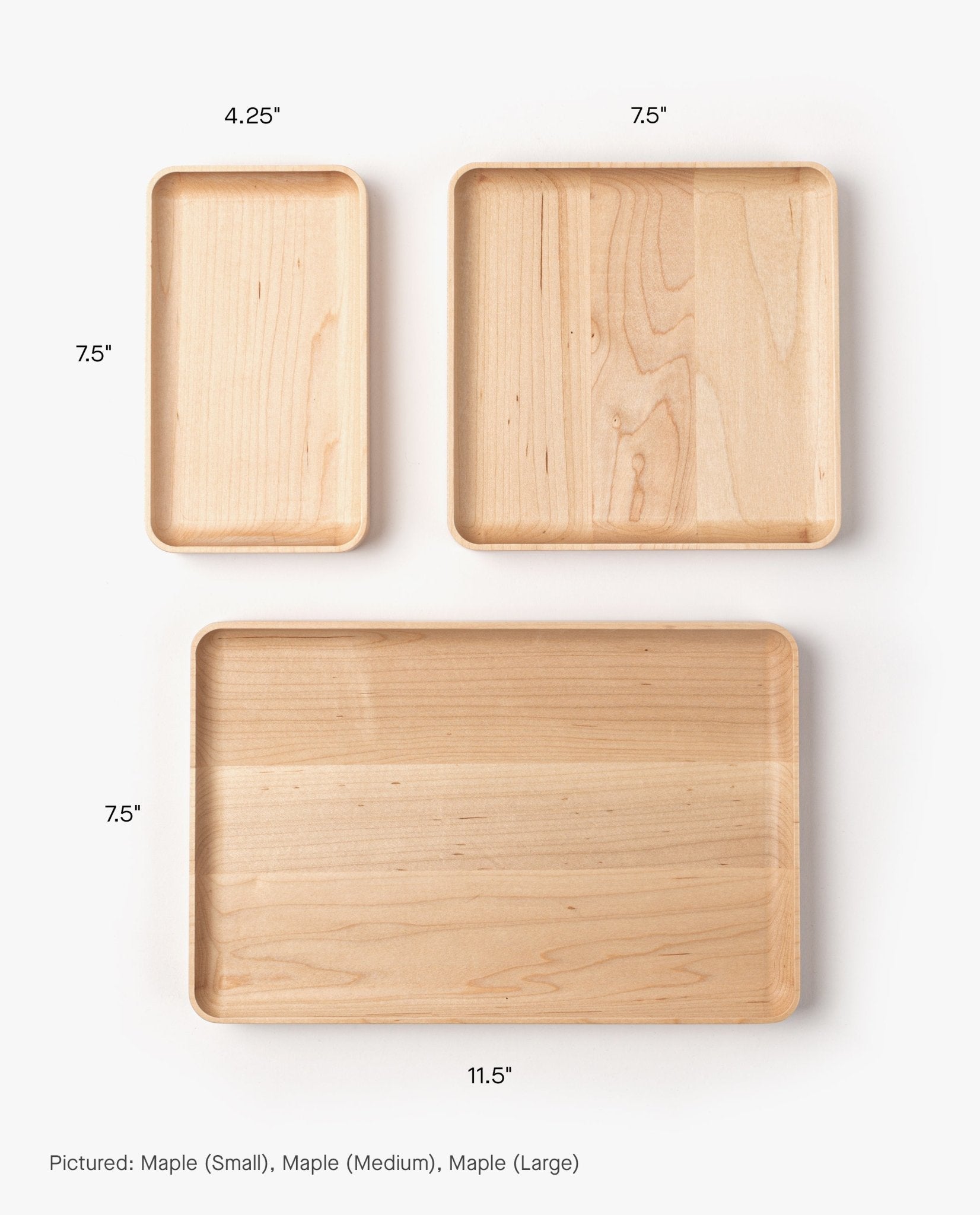 A meticulously handcrafted rectangular solid maple valet tray, shown here in the large size (7.5 x 11.5 inches), arranged on a white background.