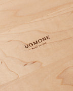 Close-up of a Valet Tray (Maple - Medium) with "UGMONK Made in USA" engraved in the center. The handcrafted maple wood grain is clearly visible.