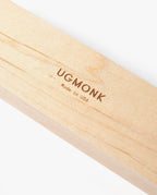 A close-up of the Pen Tray (Maple), crafted from solid maple wood and engraved with "UGMONK Made in USA," made in Pennsylvania, shown on a white background.