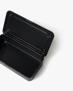 The Toyo Steel Stackable Storage Box T-190 (Black) is a black, rectangular steel toolbox with rounded corners, shown open on a white background. Made in Japan, it boasts an empty interior for versatile, durable storage and easy stacking.