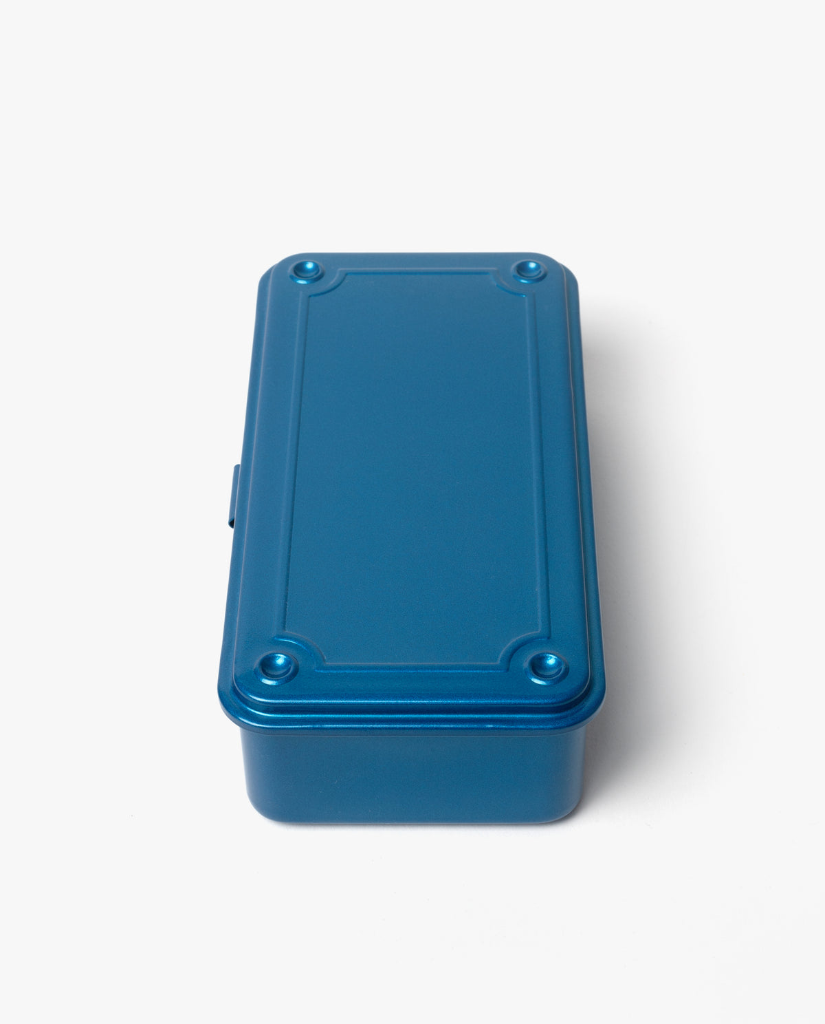 A rectangular, blue metal Toyo Steel Stackable Storage Box T-190 with rounded corners and a raised border on the lid, shown against a plain white background. Made in Japan for both style and durability, this classic box is designed to be stackable for versatile storage.