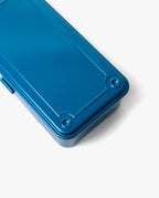 A close-up of a Toyo Steel Stackable Storage Box T-190 in blue—a metallic, rectangular tin with rounded edges and decorative grooves—is placed against a white background.