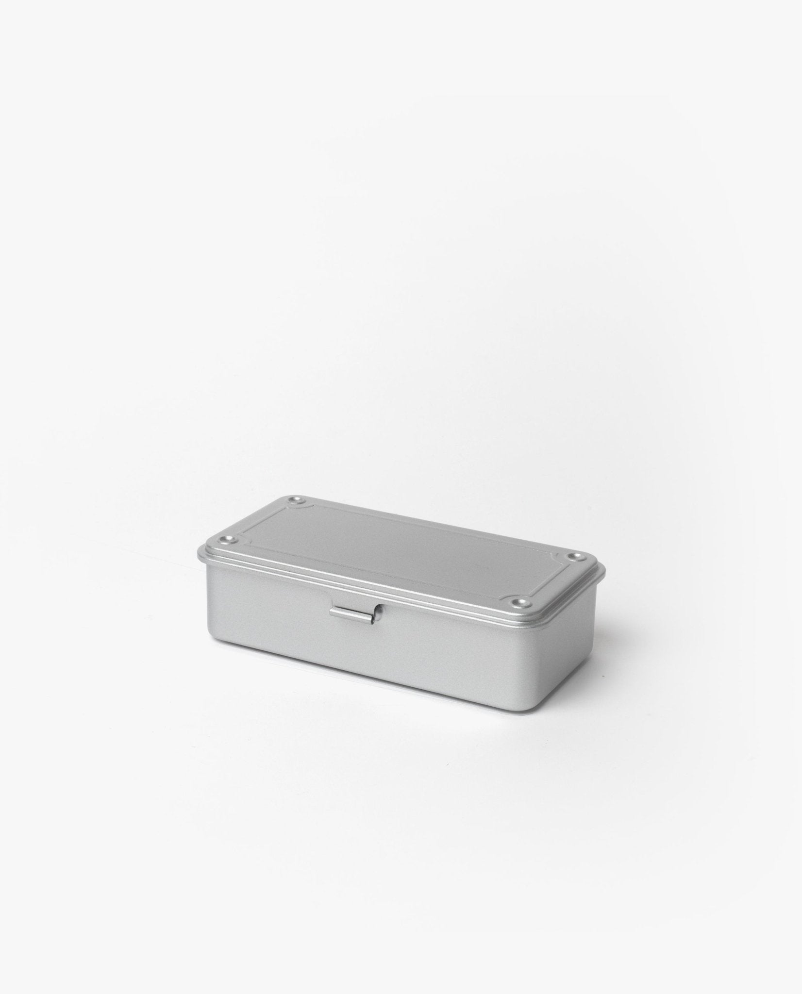 The Toyo Steel Stackable Storage Box T-190 (Silver) is a rectangular metal box with a hinged lid and latch, made in Japan. Shown here on a plain white background, it’s designed for easy stacking and durable storage.