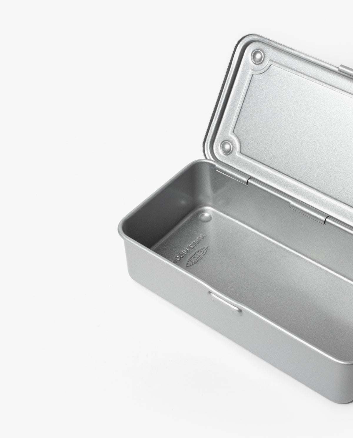 The Toyo Steel Stackable Storage Box T-190 (Silver), made in Japan, is a rectangular steel toolbox with a hinged lid partially open, revealing an empty interior. It is shown on a plain white background.