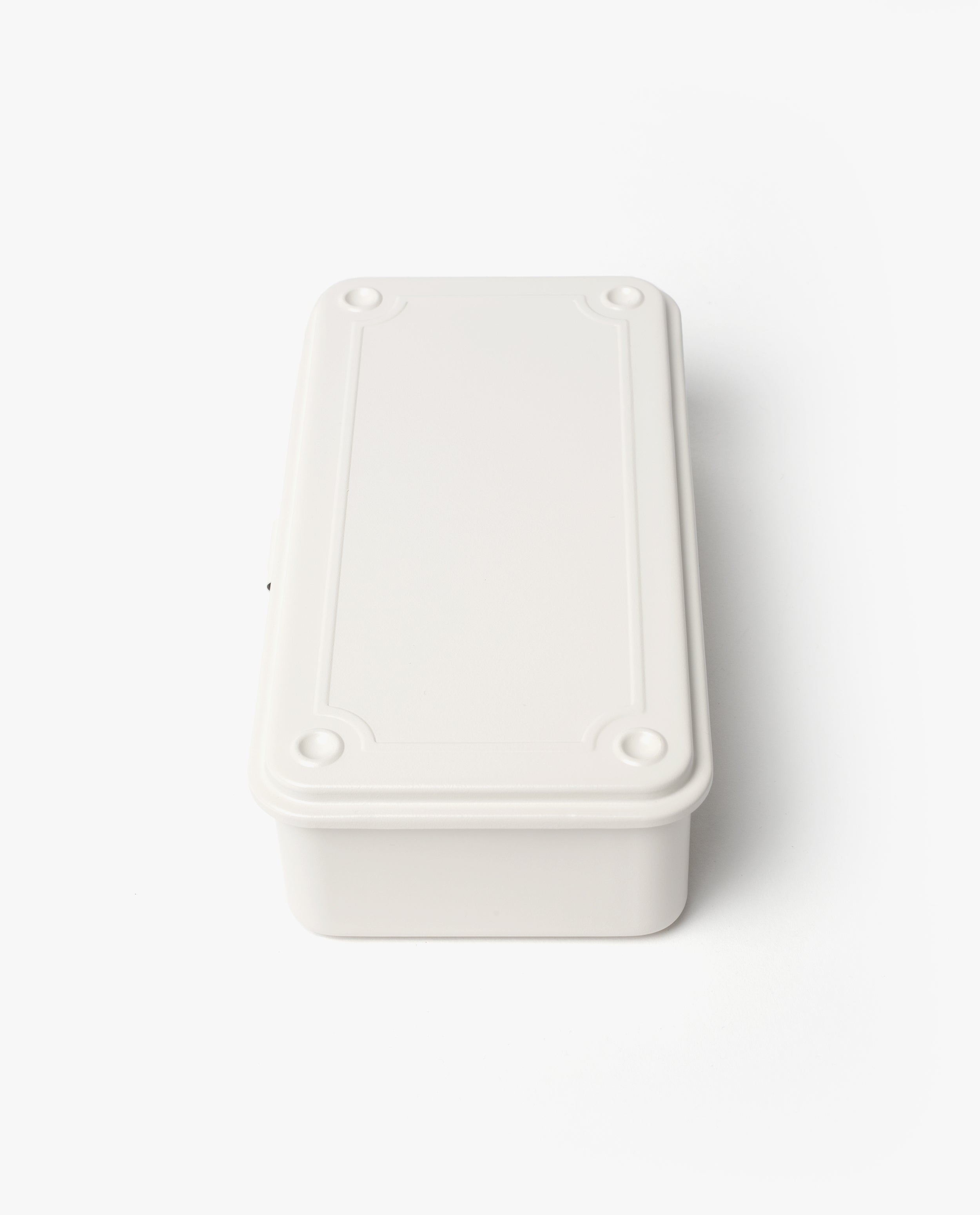 The Toyo Steel Stackable Storage Box T-190 (White) is a plain, rectangular metal storage box with rounded edges and four small circular indentations near each corner on the lid, made in Japan by Toyo Toolbox and shown on a white background.