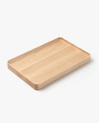 The Valet Tray (Maple - Large), featuring a handcrafted rectangular design with slightly raised edges and a light finish, is displayed on a white background.