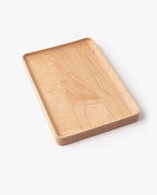 A large rectangular valet tray, handcrafted from solid maple with a smooth, light wood grain finish and slightly raised edges, is shown on a white background.