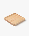The Valet Tray (Maple - Medium) is a handcrafted, square, shallow tray with rounded edges made from solid maple wood and shown on a plain white background.