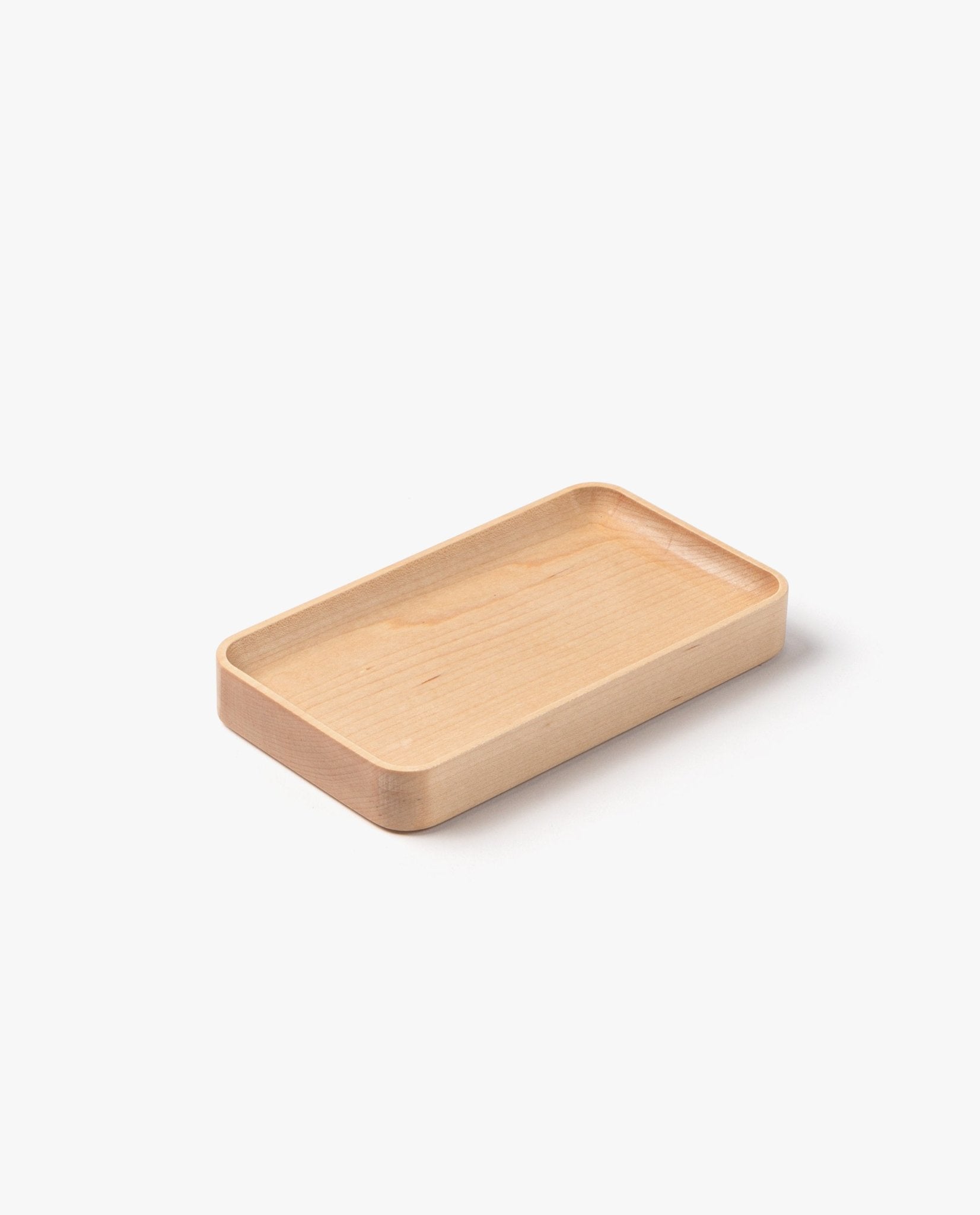 The Valet Tray (Maple - Small) is a handcrafted, rectangular tray with rounded corners, made from solid maple and shown on a white background.