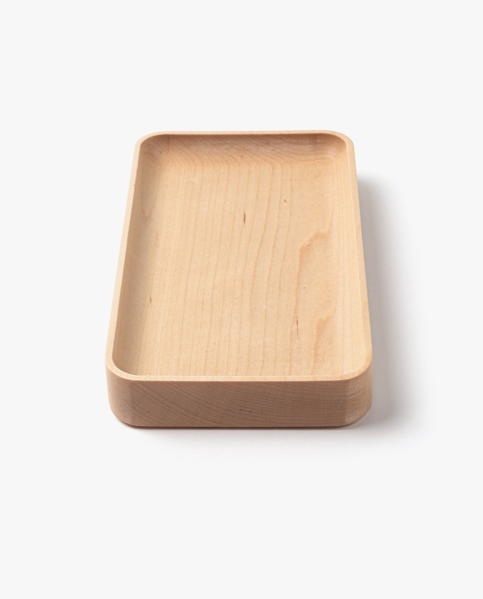 A small rectangular handcrafted solid maple Valet Tray with rounded edges and shallow sides, displayed against a plain white background.