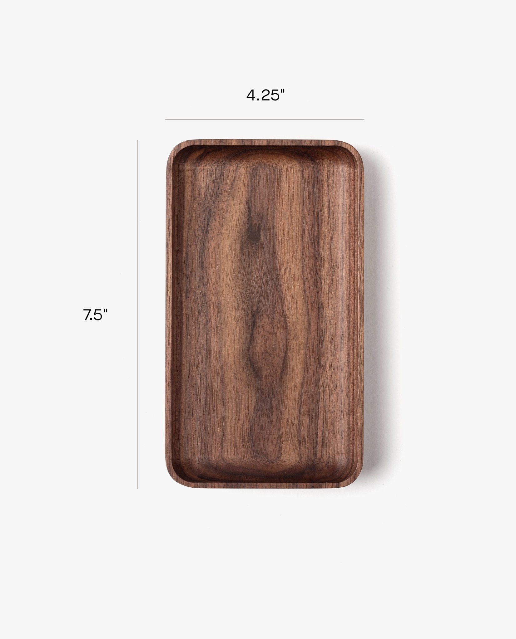 The Valet Tray (Walnut - Small) is a handcrafted rectangular tray from Pennsylvania, measuring 7.5" x 4.25" with rounded corners—perfect for everyday carry items and shown on a white background with measurement lines.