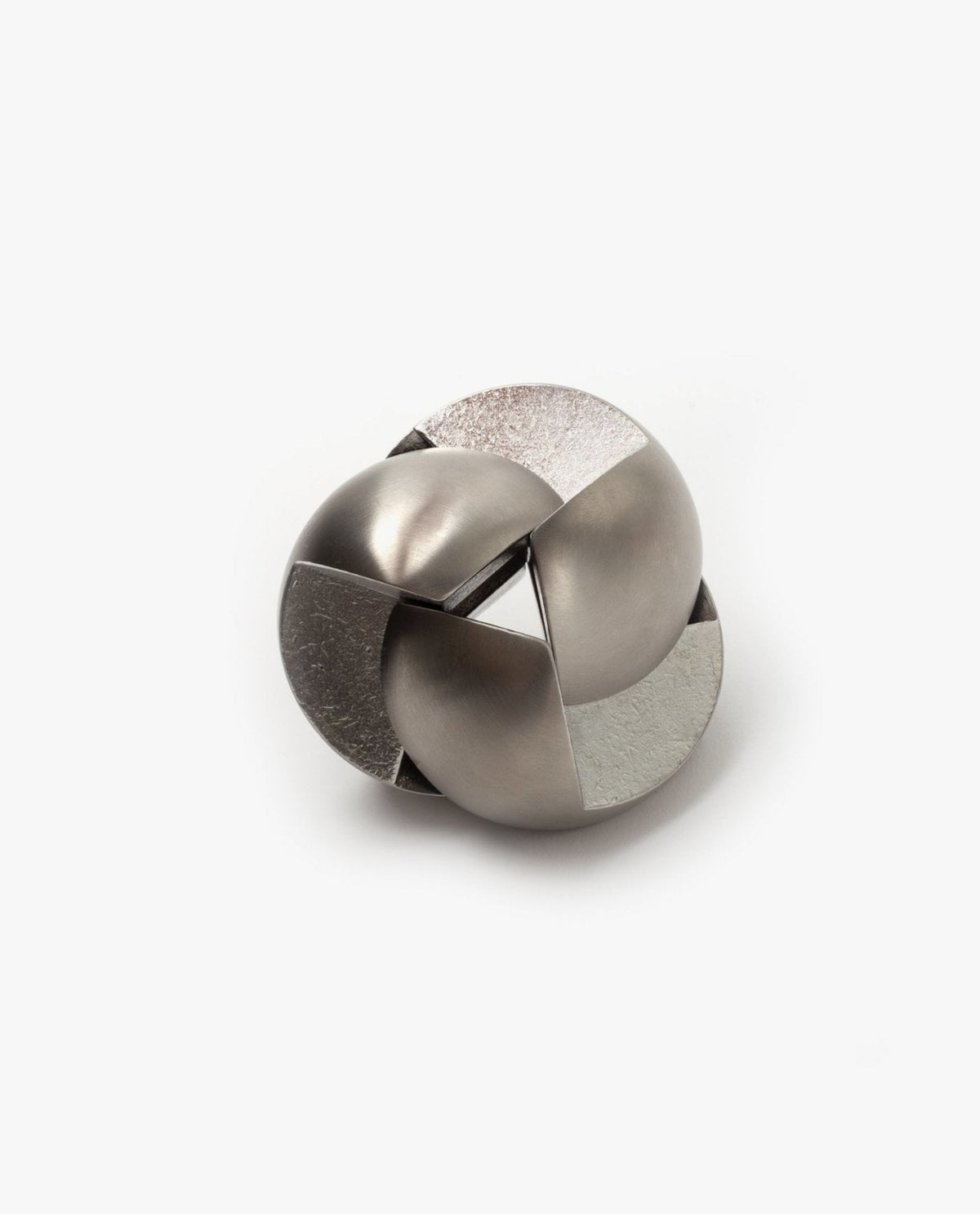 The Craighill Venn Puzzle (Stainless Steel) is a metallic, interlocking mechanical puzzle featuring smooth and brushed silver surfaces with a complex, rounded shape set against a plain white background.